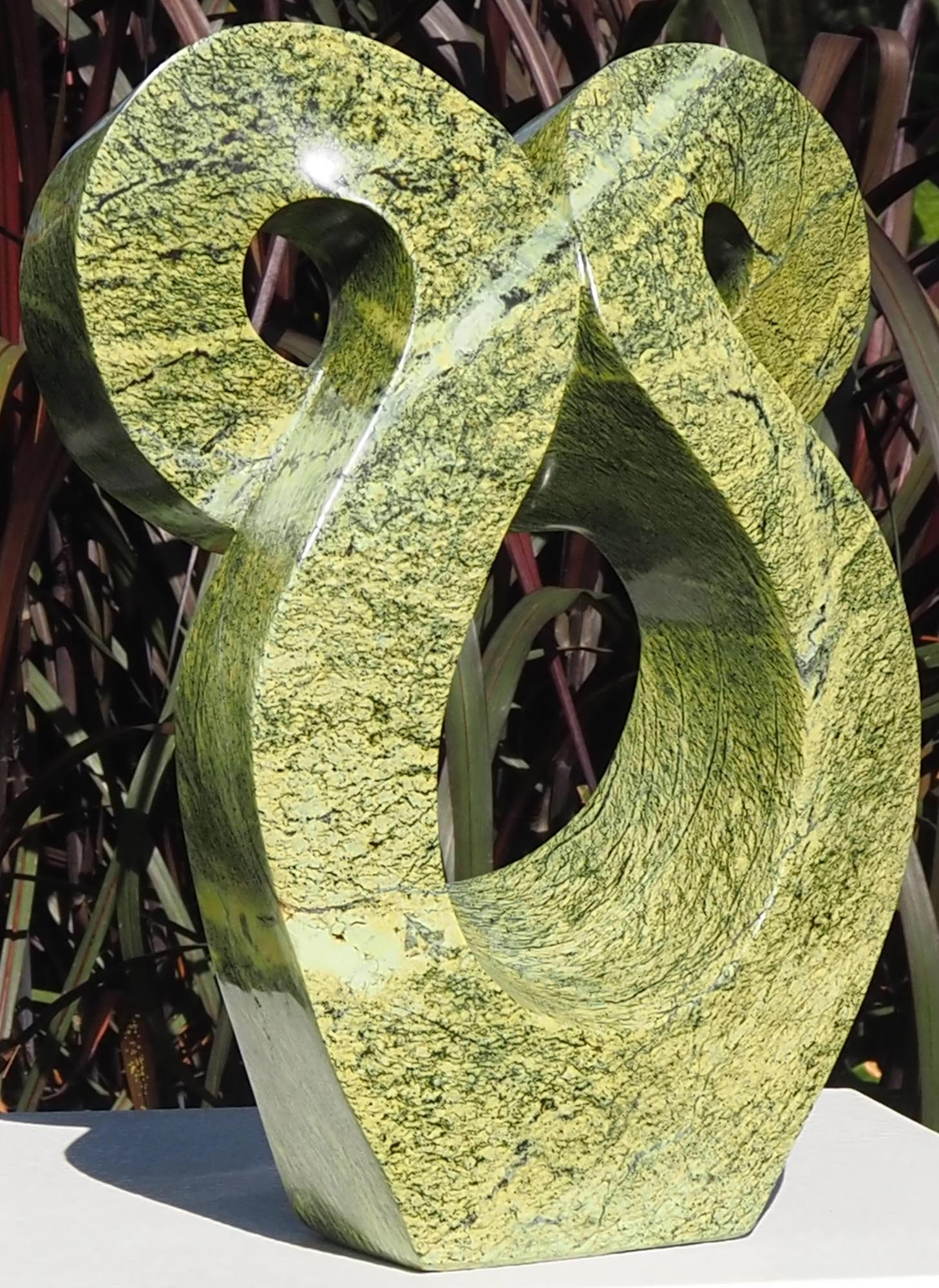 Green stone owl sculpture carving - Wise Bird by Charles Kowo - front left