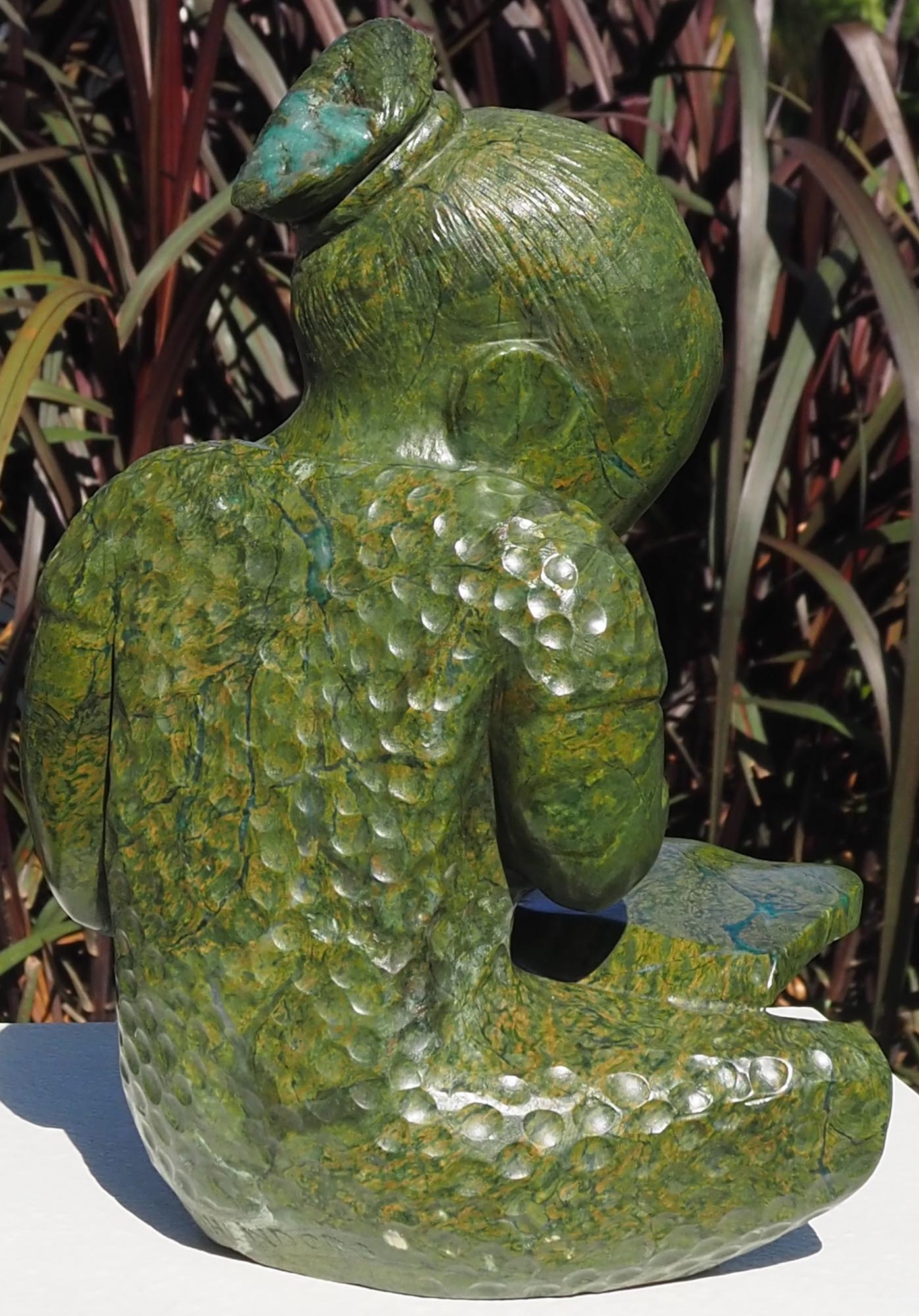 Green stone sculpture child girl book - Joy of Reading by Jonathan Mhondorohuma - back right