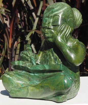Green stone sculpture child girl book - Writing A Story by Jonathan Mhondorohuma - main image
