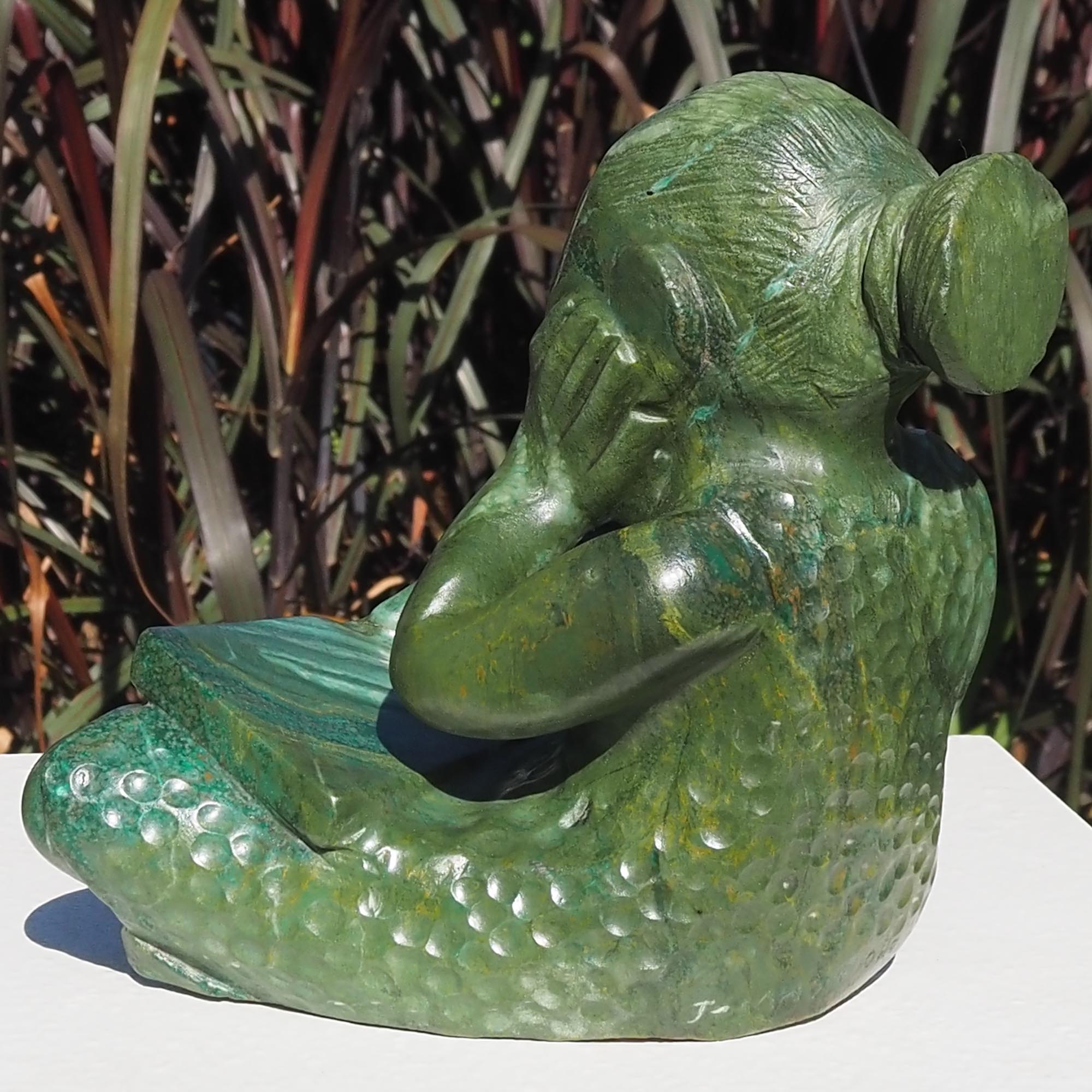 Green stone sculpture child girl book - Writing A Story by Jonathan Mhondorohuma - back left