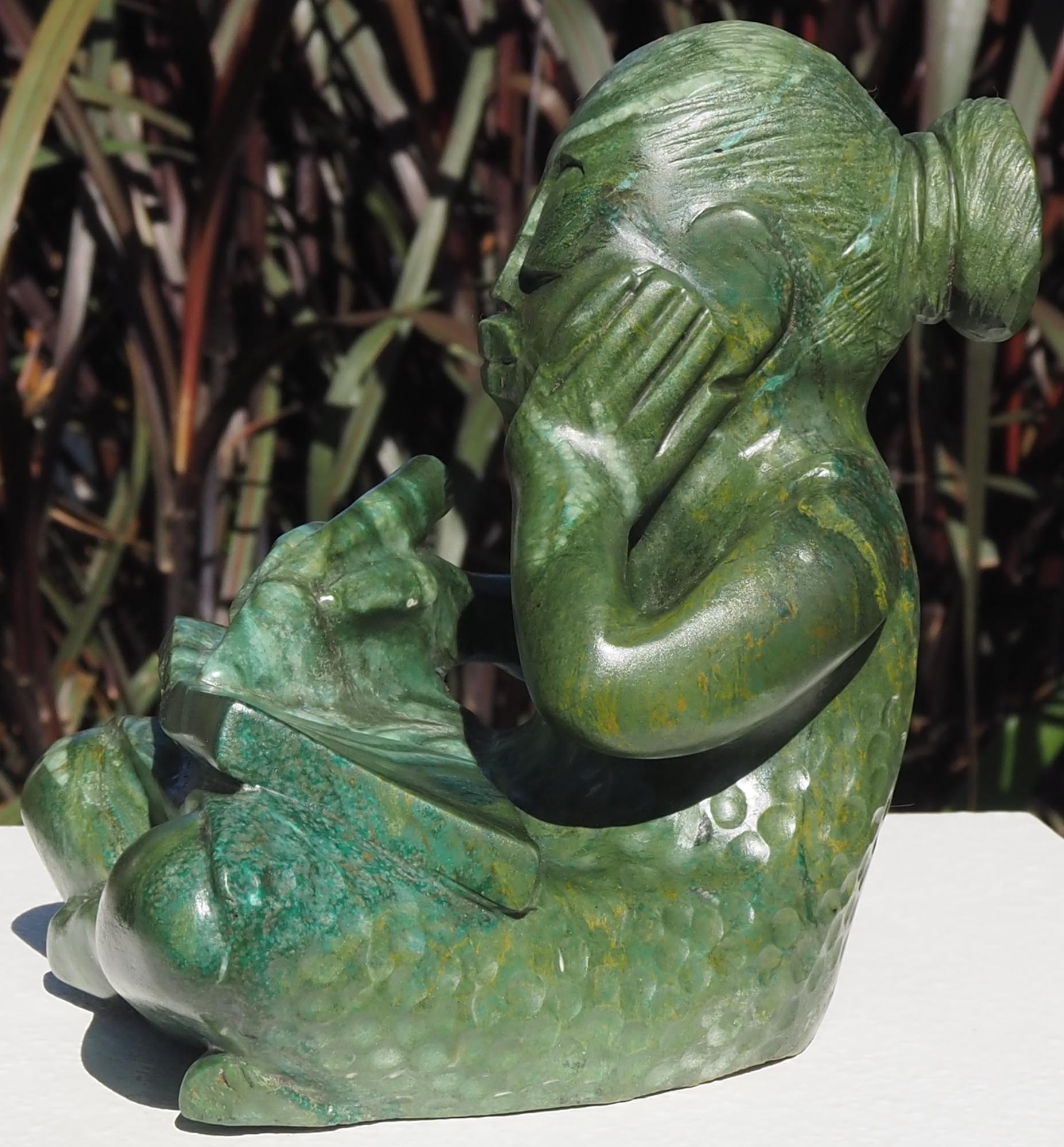 Green stone sculpture child girl book - Writing A Story by Jonathan Mhondorohuma - right side