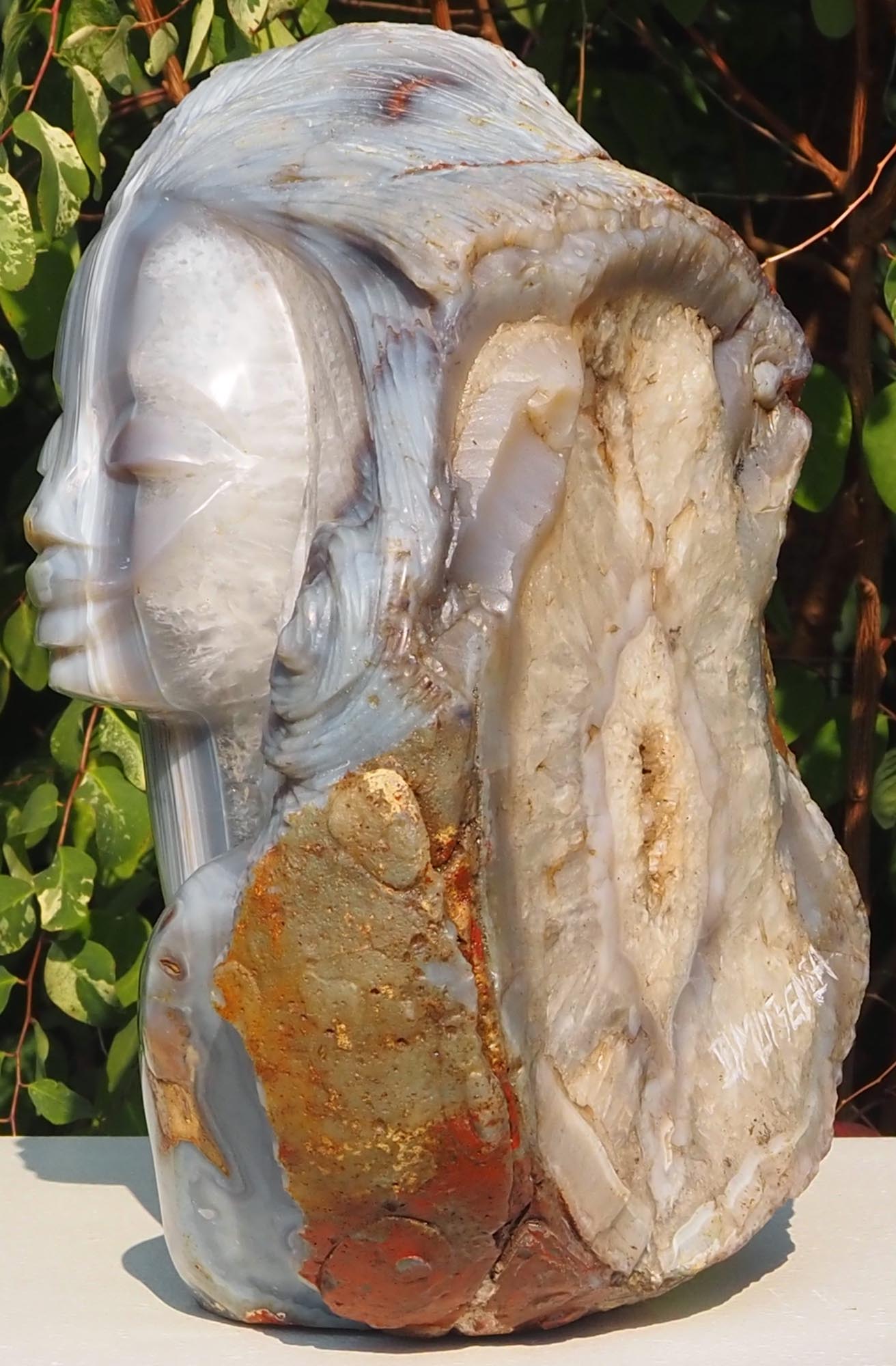 Beautiful woman stone sculpture - King's Wife by Rufaro Murenza - right side profile