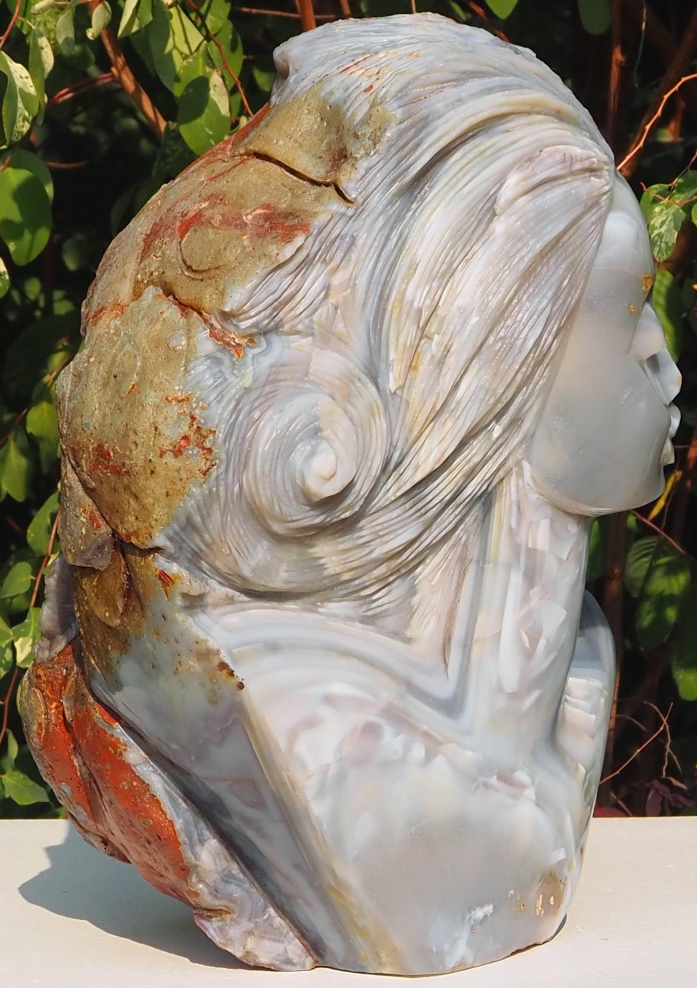 Beautiful woman stone sculpture - King's Wife by Rufaro Murenza - left side
