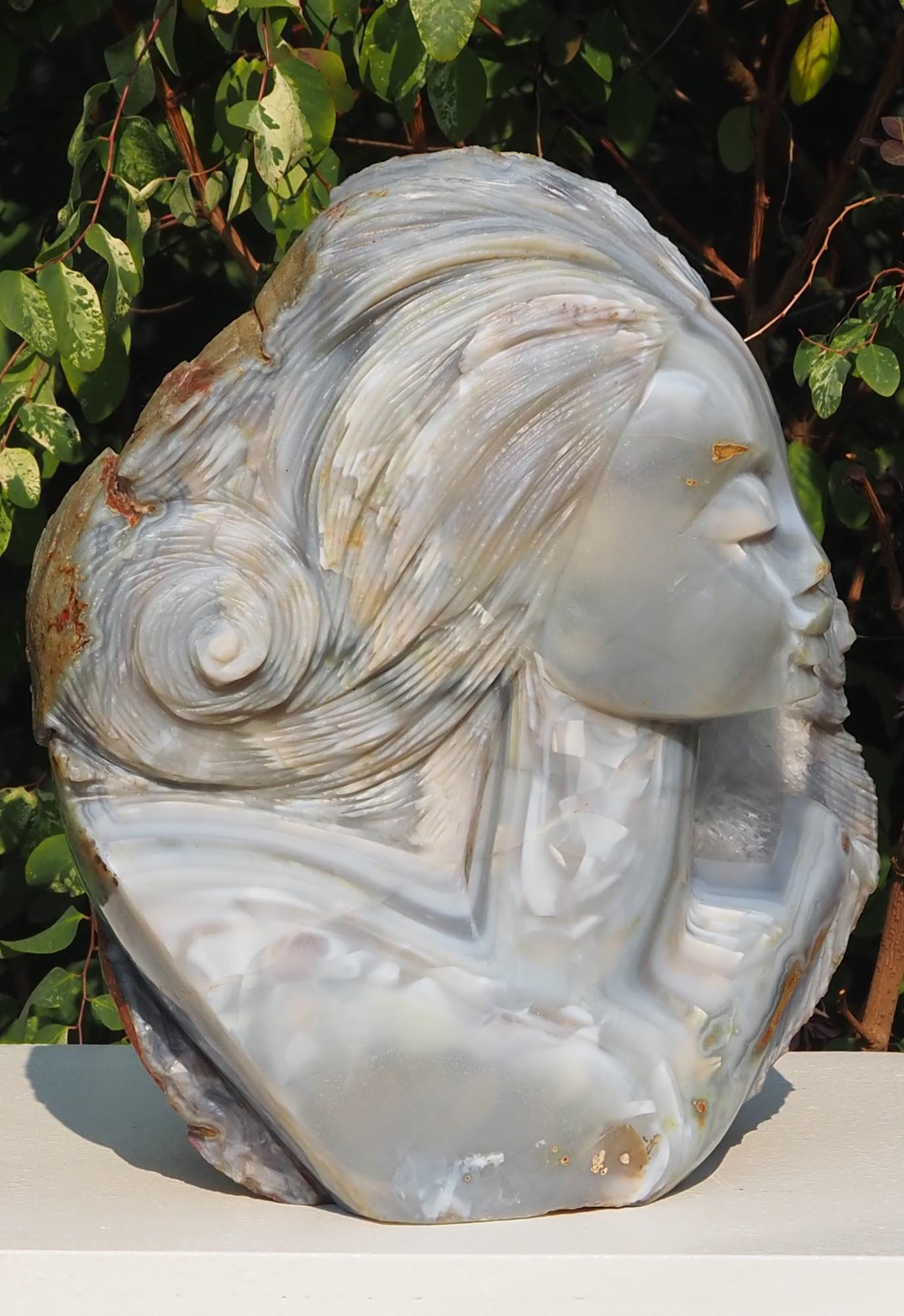Beautiful woman stone sculpture - King's Wife by Rufaro Murenza - front left