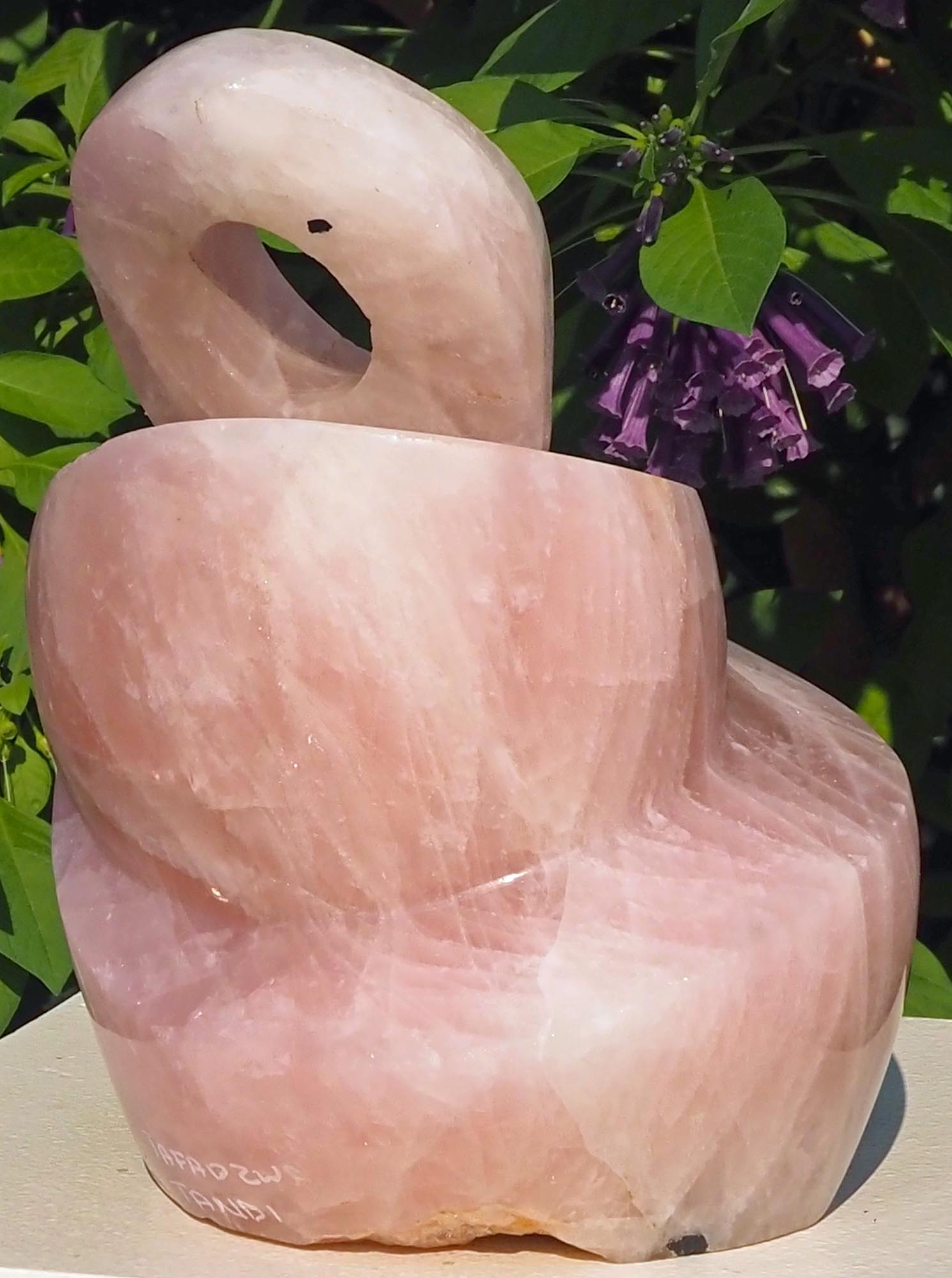 Rose quartz pink stone sculpture art UK - Family Guardian by Tafadzwa Tandi - back right