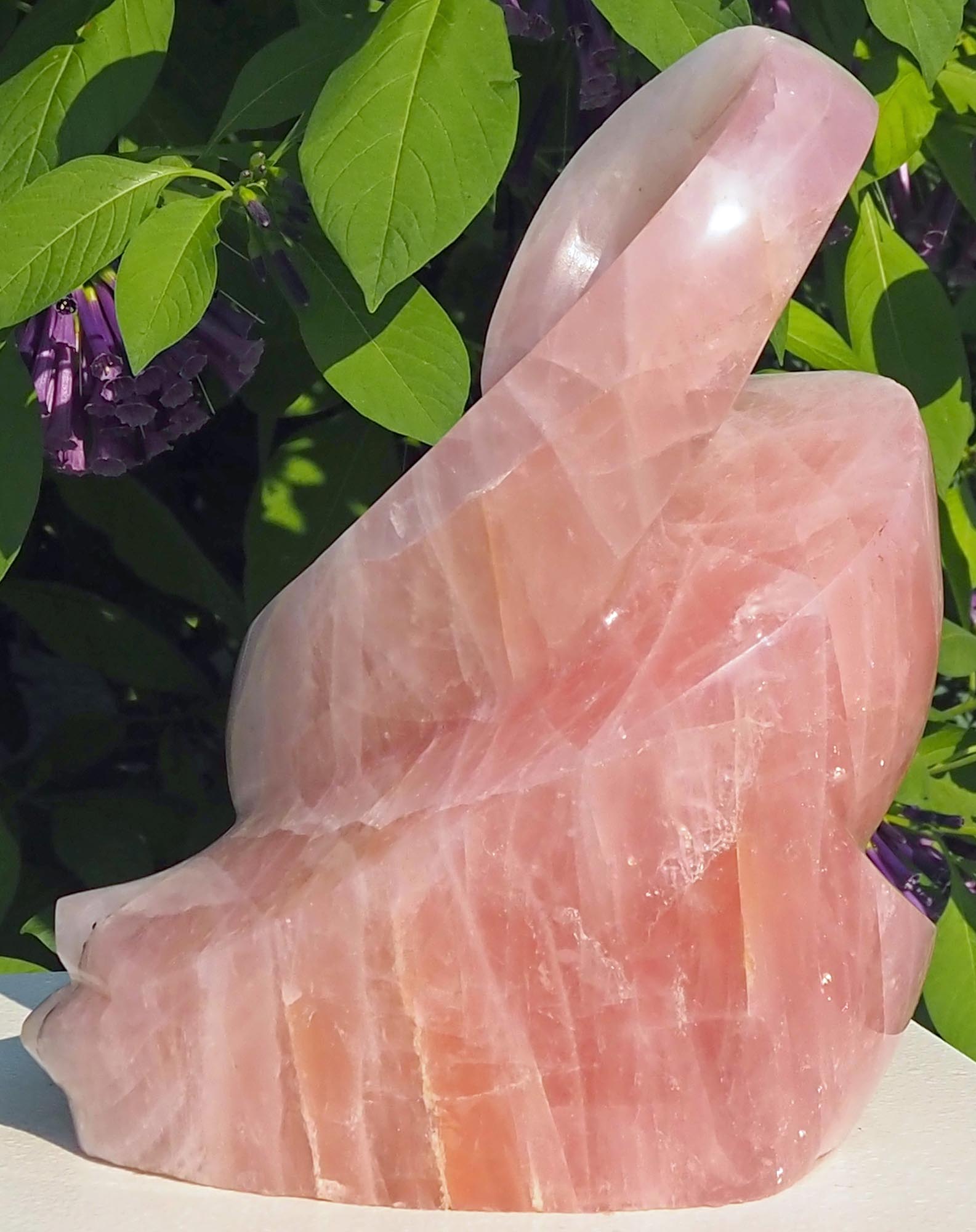 Rose quartz pink stone sculpture art UK - Family Guardian by Tafadzwa Tandi - right side
