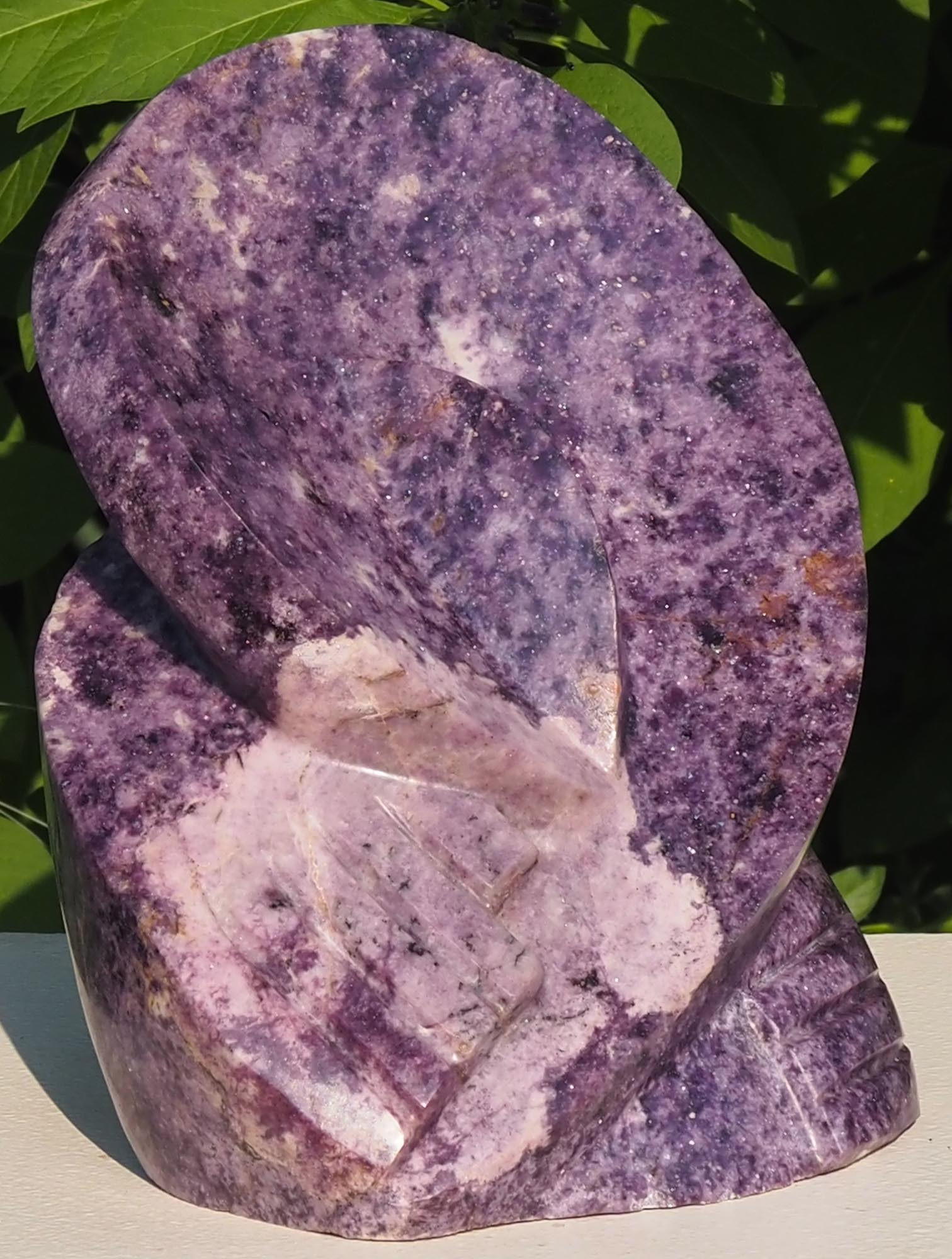 Purple stone sculpture goth art - Tender Touch by Tafadzwa Tandi - front left