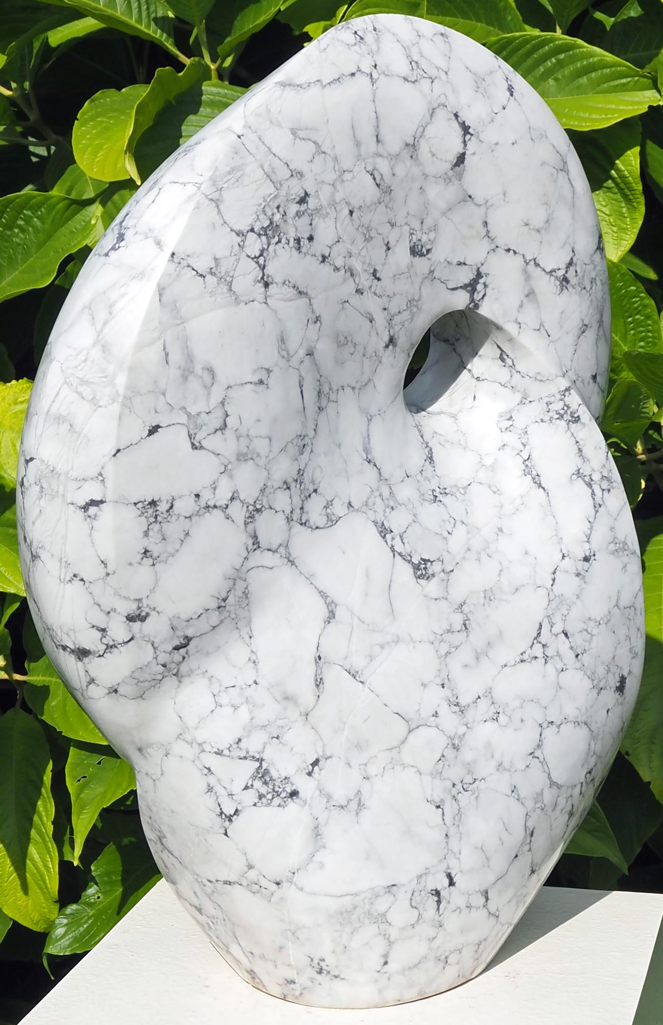 Original contemporary African stone sculpture art - Full Of Ideas by Tendai Gwaravaza - back left