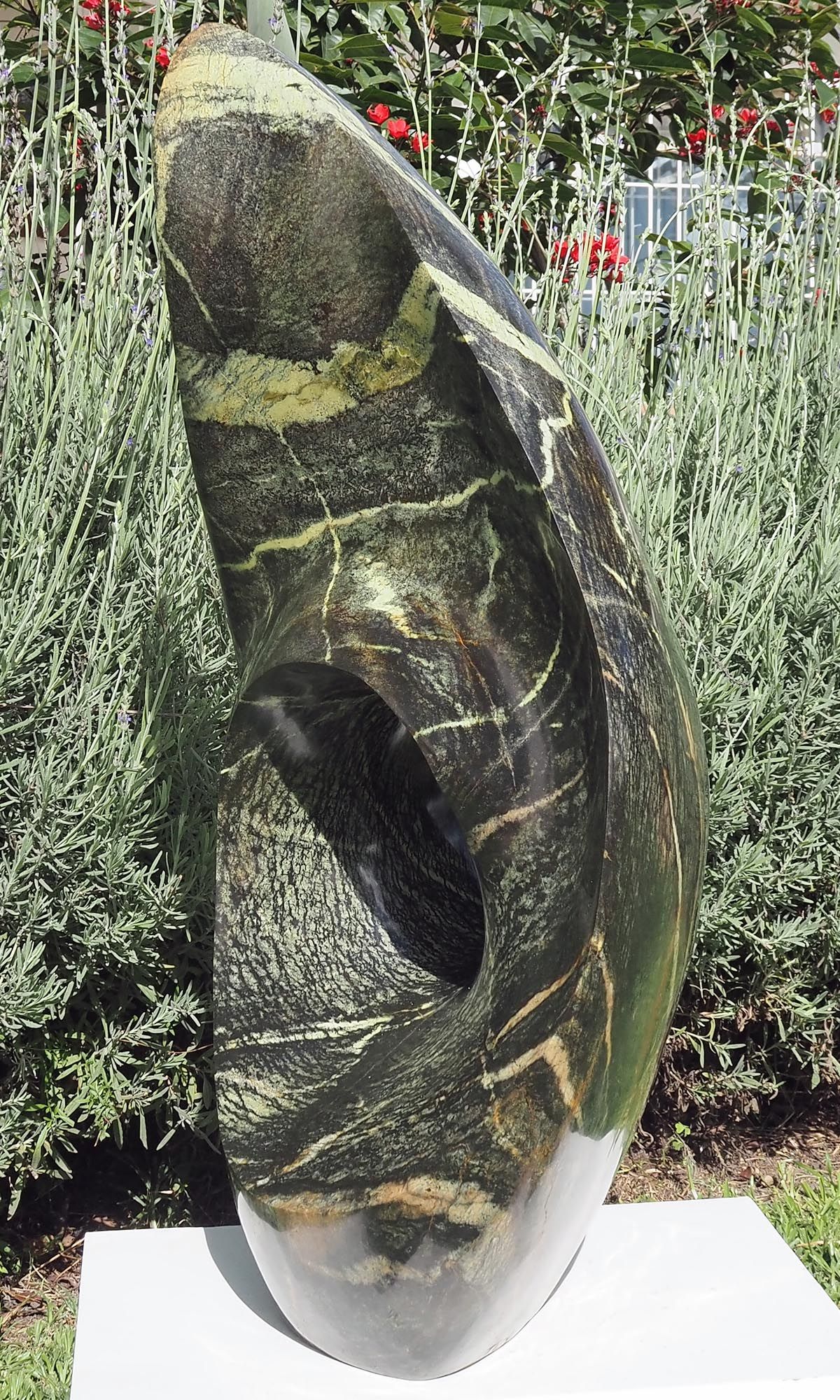 One-off stone garden sculpture centrepiece UK - Healing Herb by Tendai Gwaravaza - right side