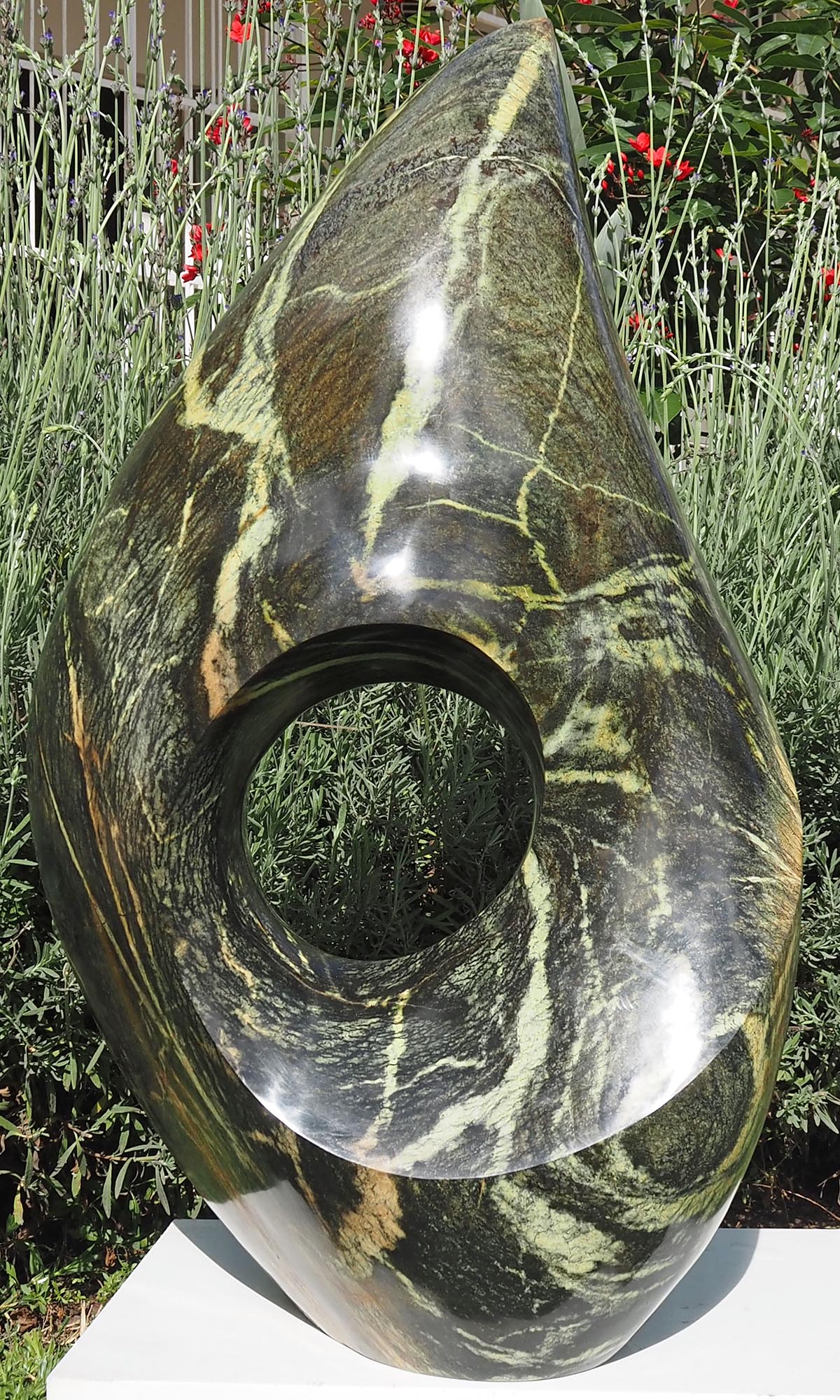 One-off stone garden sculpture centrepiece UK - Healing Herb by Tendai Gwaravaza - back