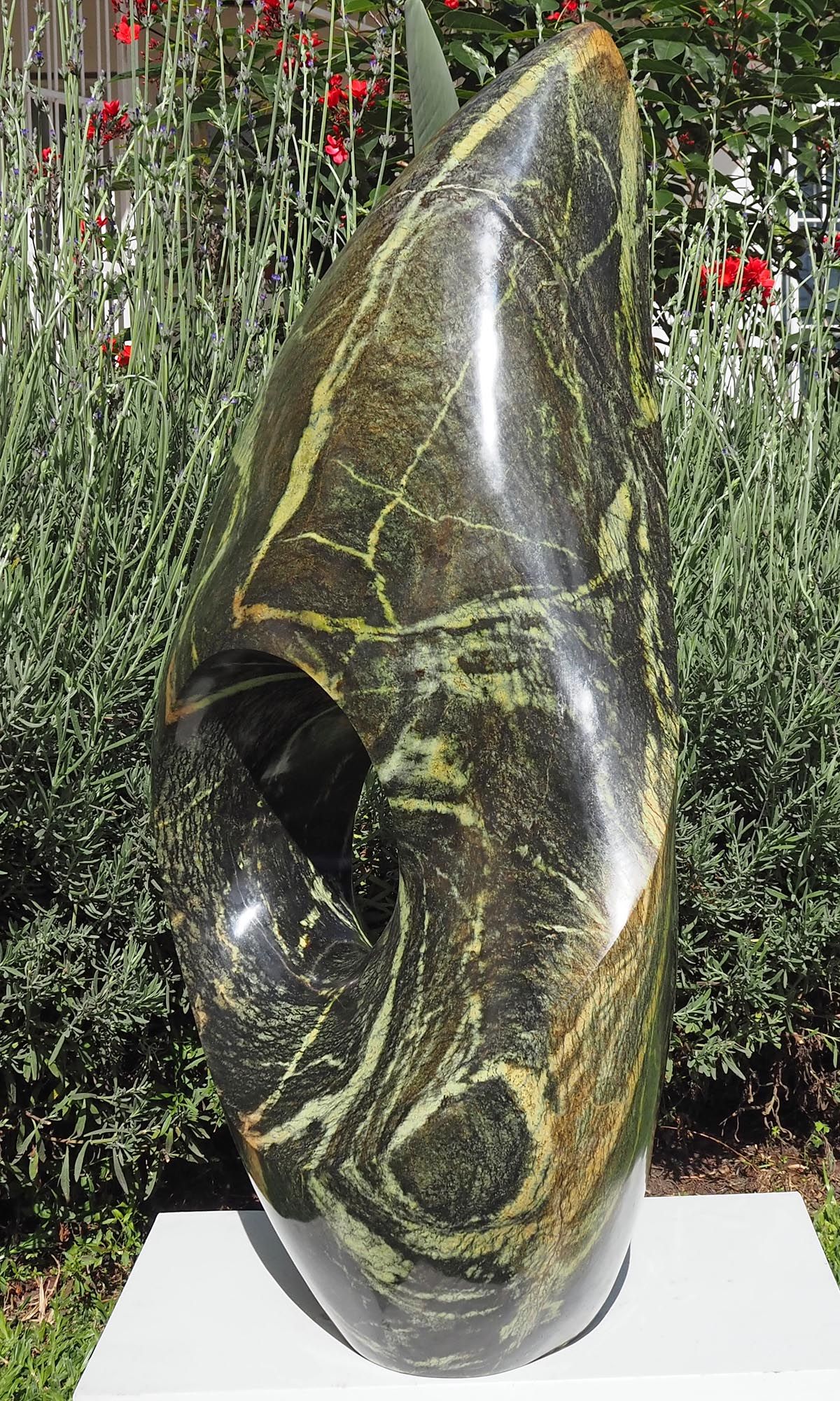 One-off stone garden sculpture centrepiece UK - Healing Herb by Tendai Gwaravaza - back right