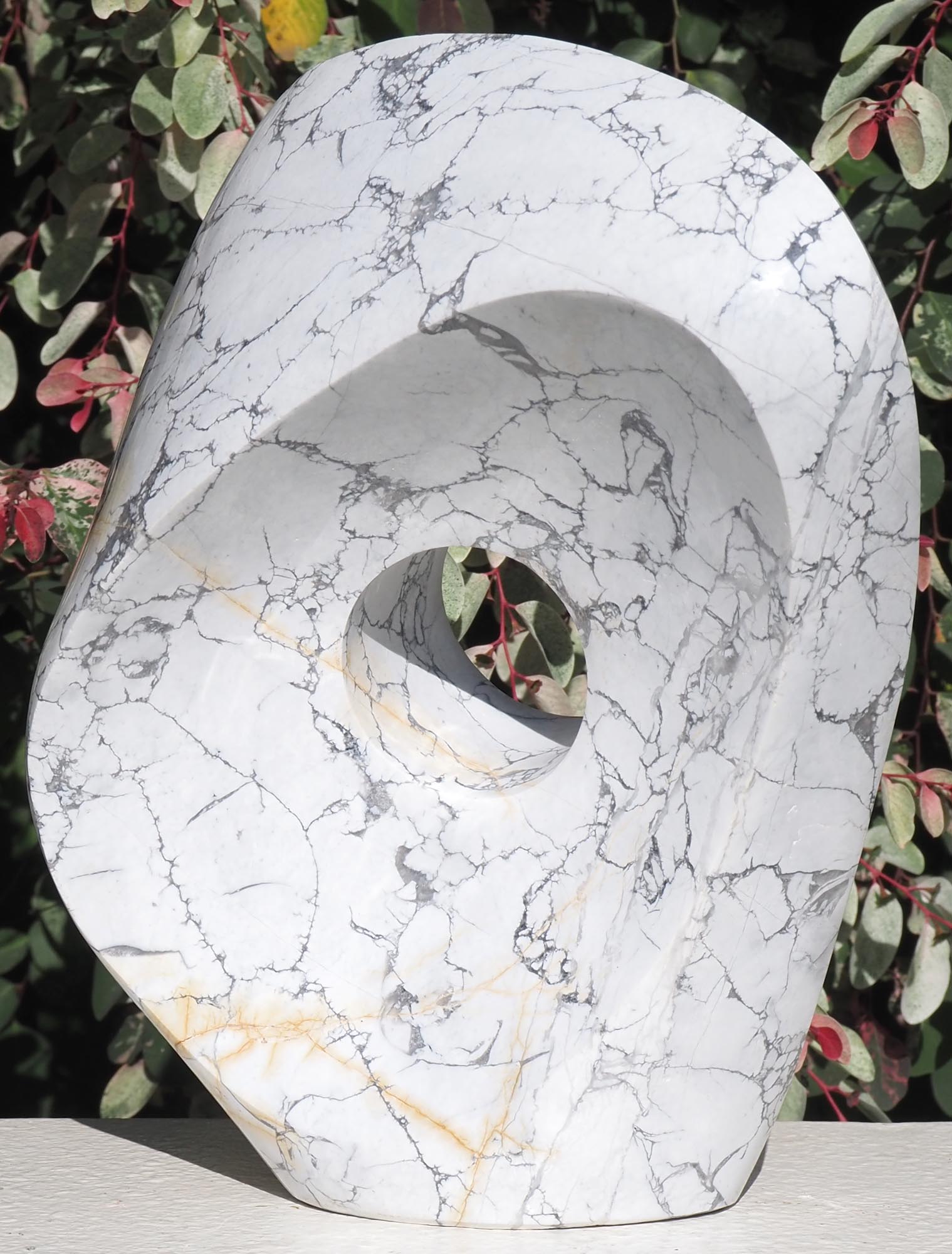 Original contemporary African stone sculpture art - Full Of Ideas by Tendai Gwaravaza - front right