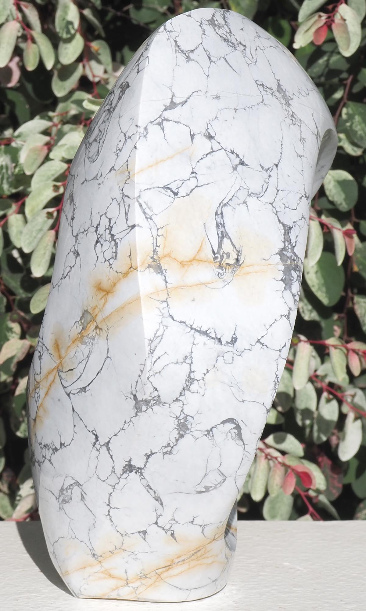 Original contemporary African stone sculpture art - Full Of Ideas by Tendai Gwaravaza - left side