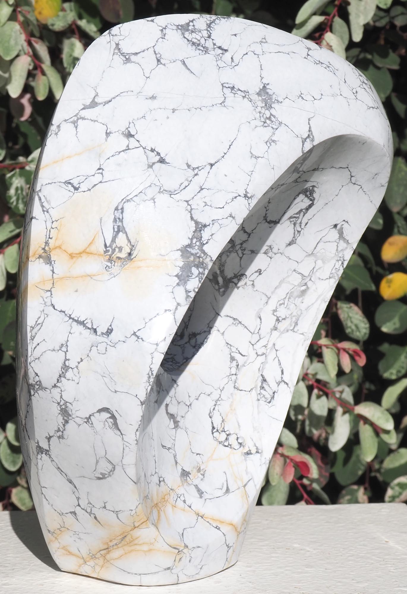 Original contemporary African stone sculpture art - Full Of Ideas by Tendai Gwaravaza - front left