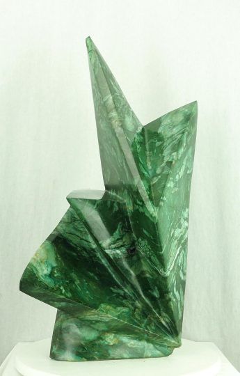 Angular one-off Shona sculpture in bright green verdite stone - Positive Mind by Tafadzwa Tandi