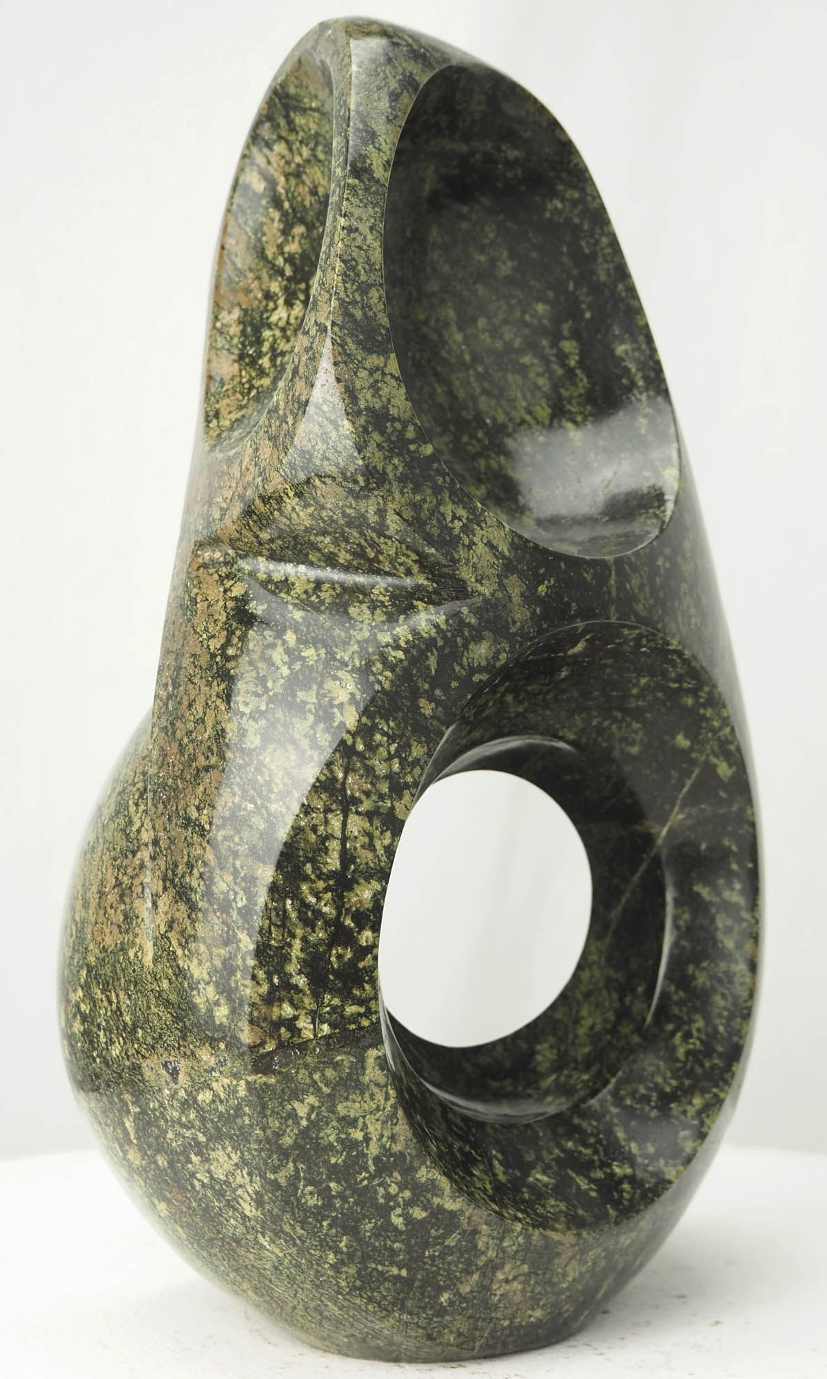 Unique abstract stone sculpture affordable gift - Preening Bird by Munyaradzi Jeche - back left view