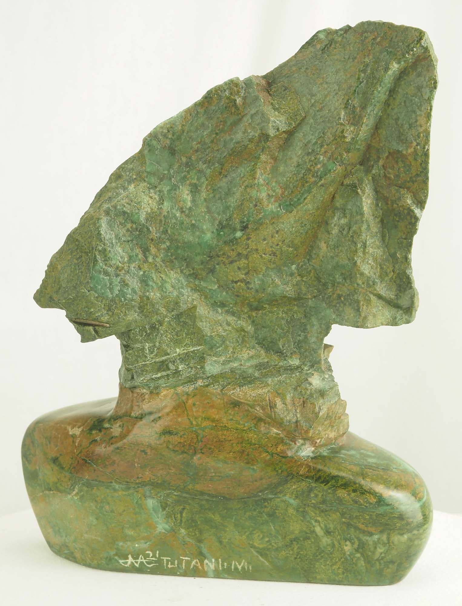 Verdite sculpture from Zimbabwe of a lady's head - Waiting For A Kiss by Tutani Mgabazi - back